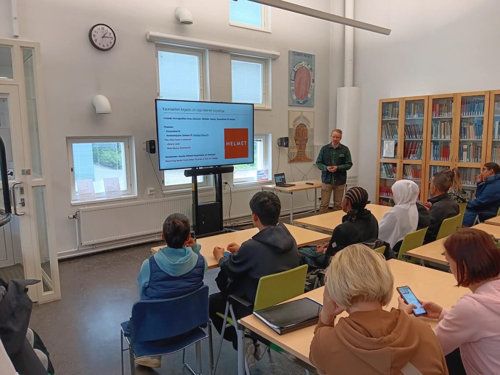 Our Finnish language course students are having a lection about library services.